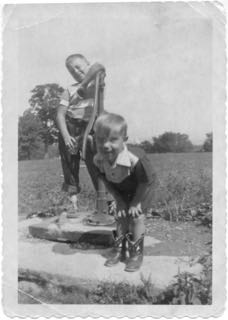 me and my brother, Herb, at water pump summer 1952